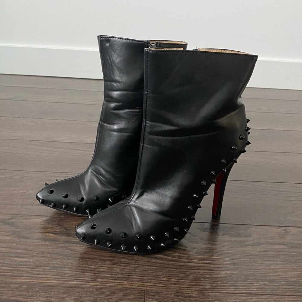 CHRISTIAN LOUBOUTIN Black Ankle Boots with Spike Details